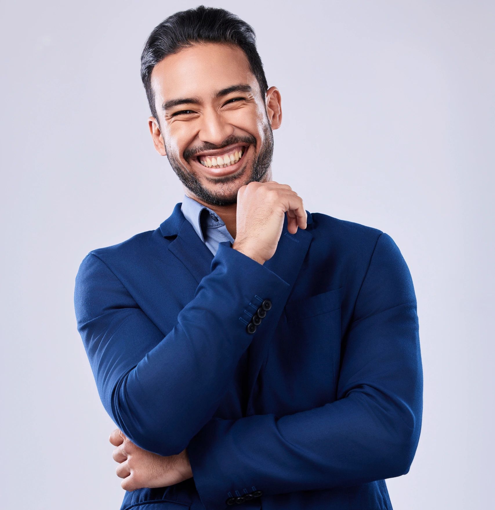 Professional headshot of a smiling businessman