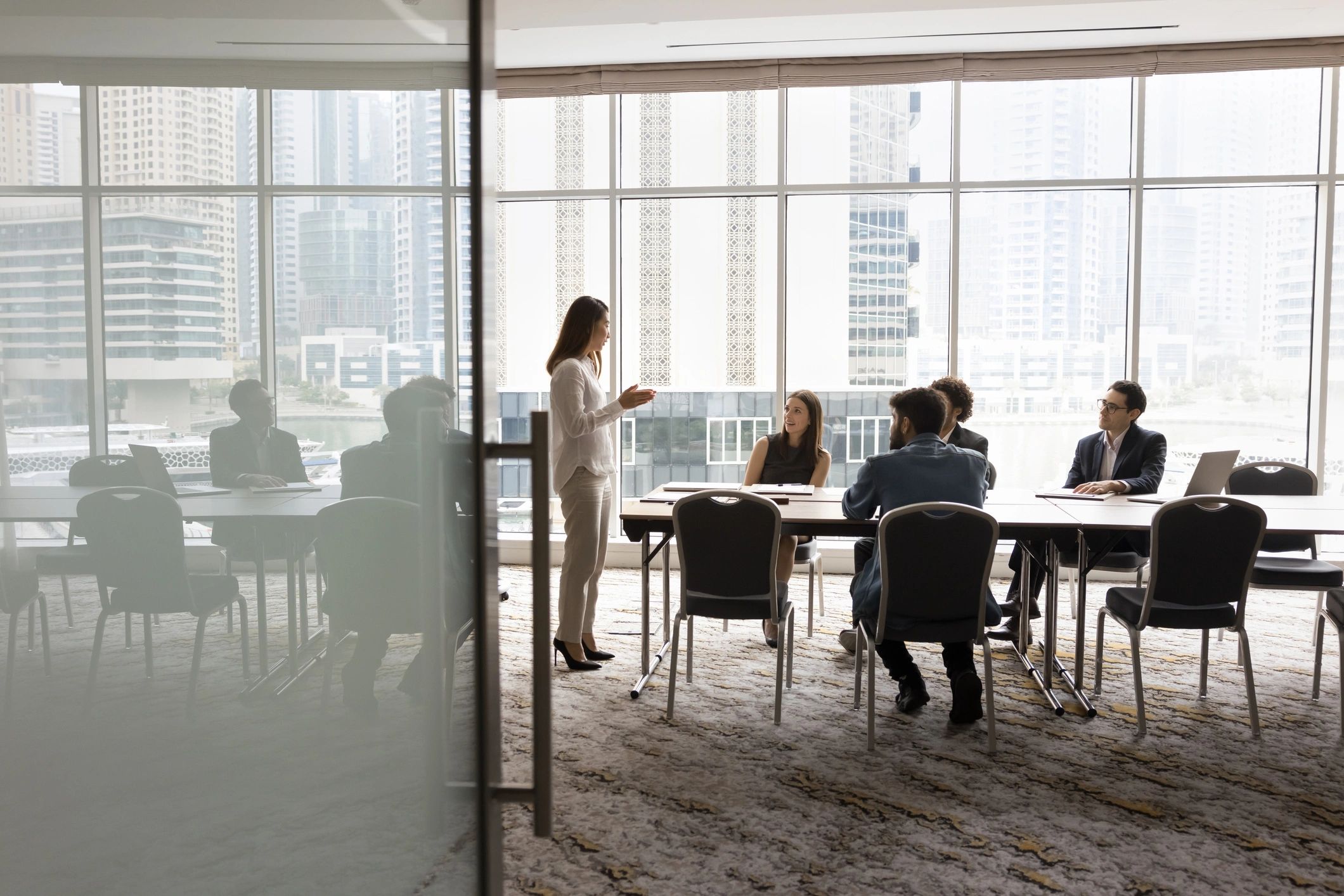 Multiethnic business team collaborating at a meeting table