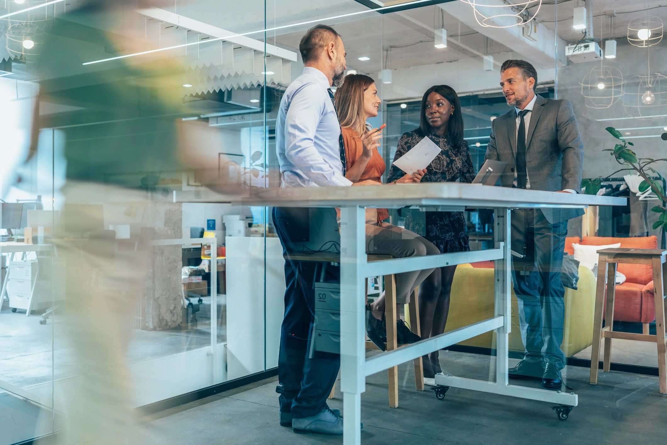 Business professionals working in a modern conference environment